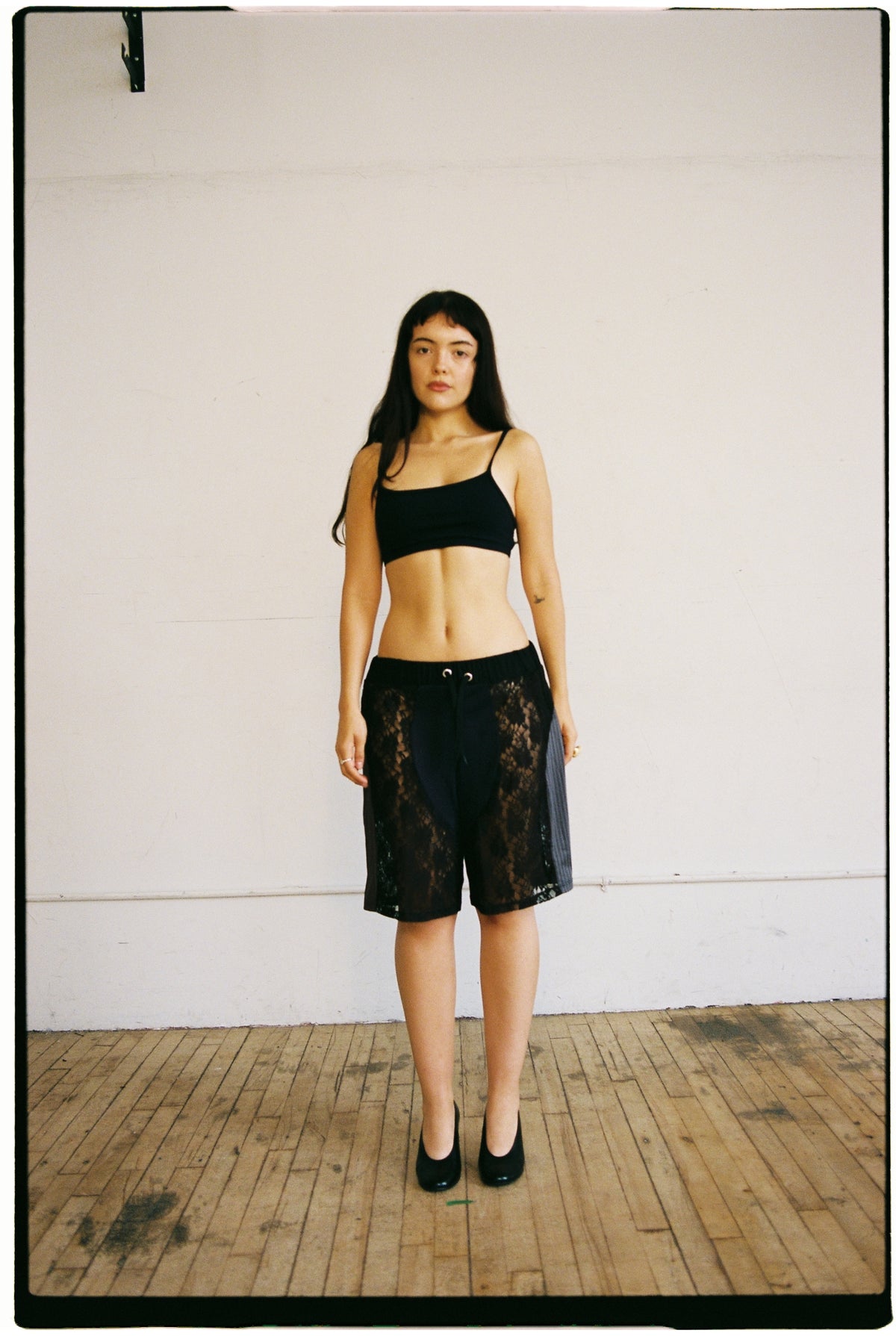 black footy shorts